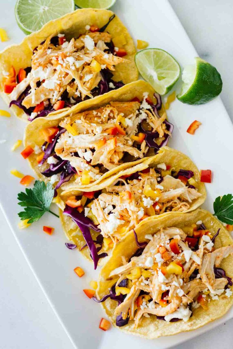Healthy Sriracha Shredded Chicken Tacos! YUM! Perfect for a quick and easy weeknight meal.