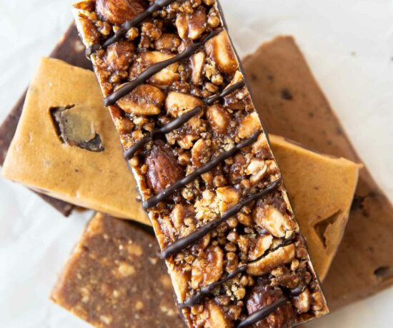 5 protein bars stacked on top of each other.