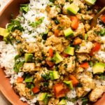 Chimichurri Chicken Bowls recipe with fresh parsley and peppers.