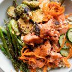 Hot Honey Salmon Bowl recipe with a fork.