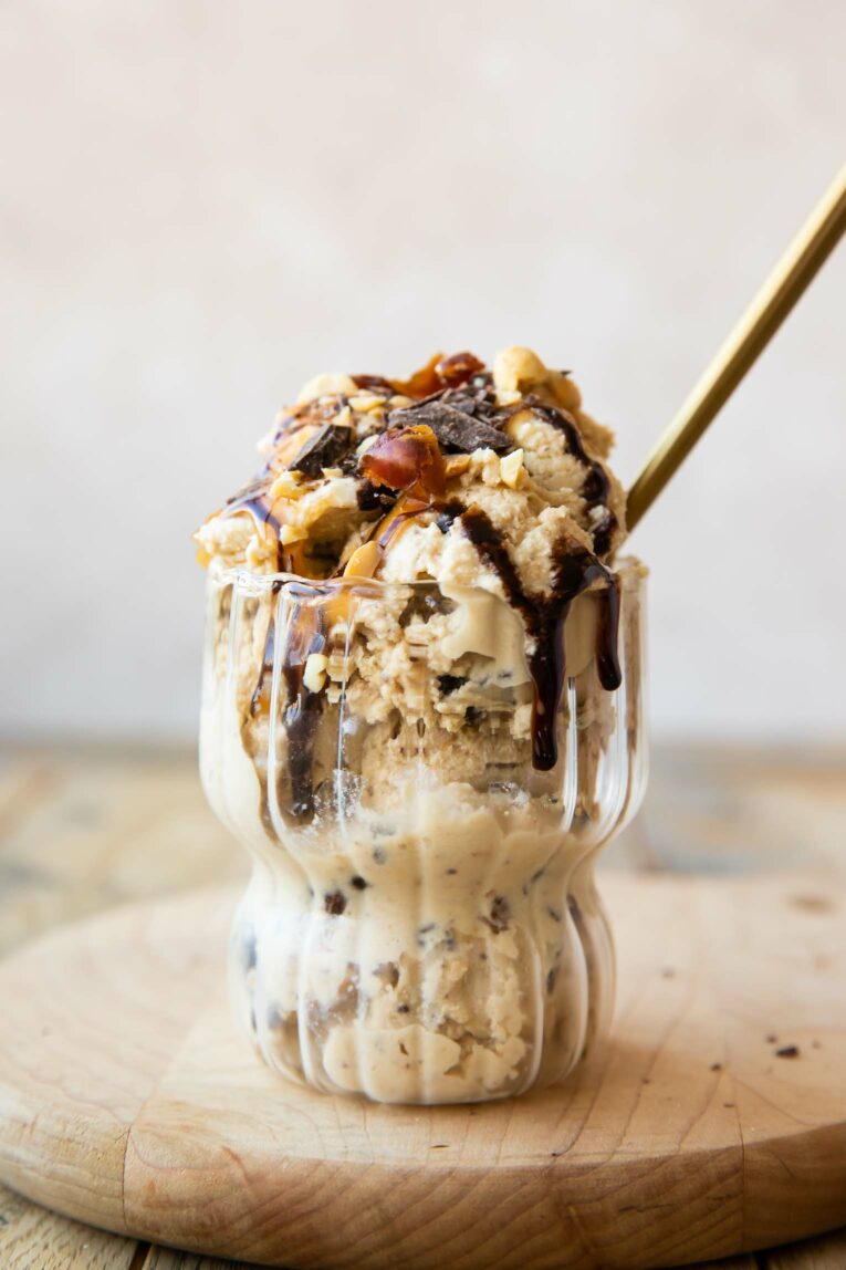 Ninja Creami Snickers Protein Ice Cream recipe in a parfait glass.