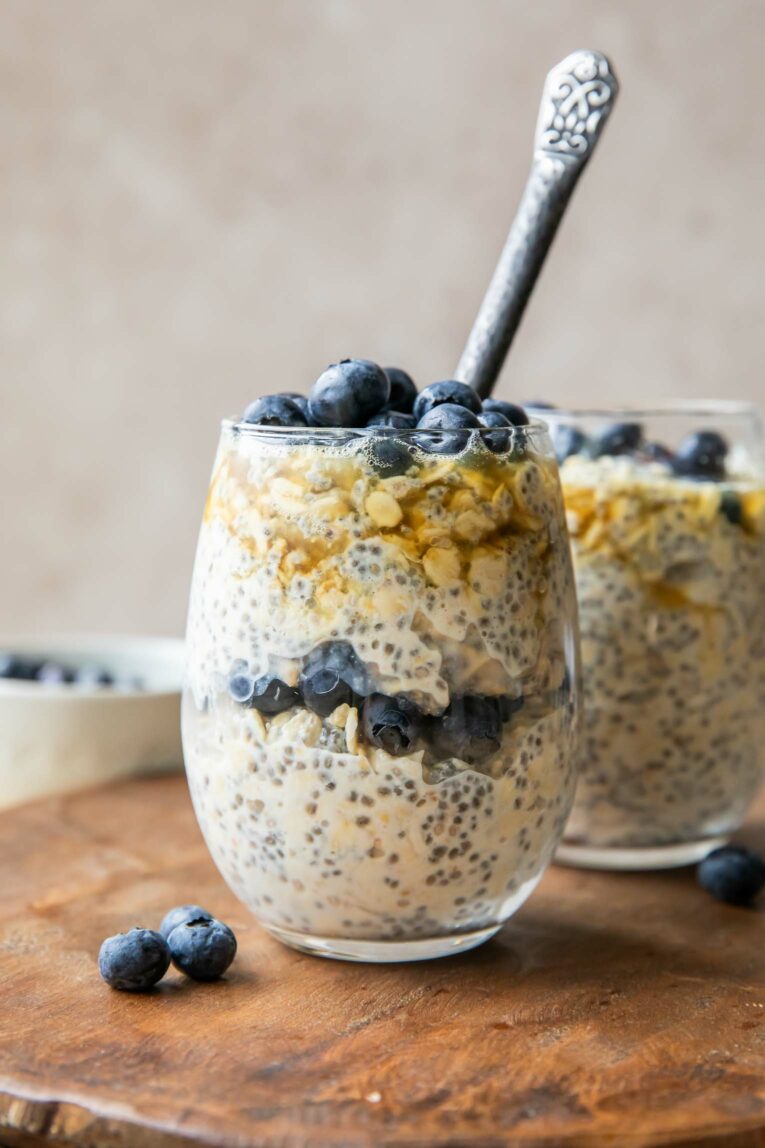 Chia seed oats recipe with blueberries in a glass.