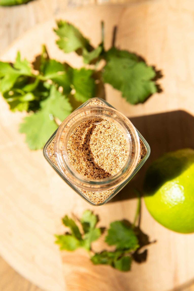 Top shot close up of homemade Taco Seasoning in a spice jar.