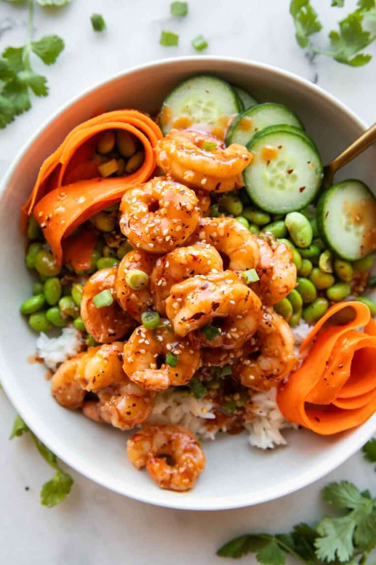 Sticky Garlic Sesame Shrimp in a bowl.