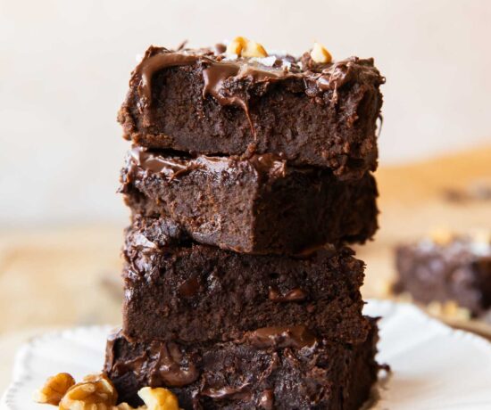 Black bean brownies stacked on top of each other.