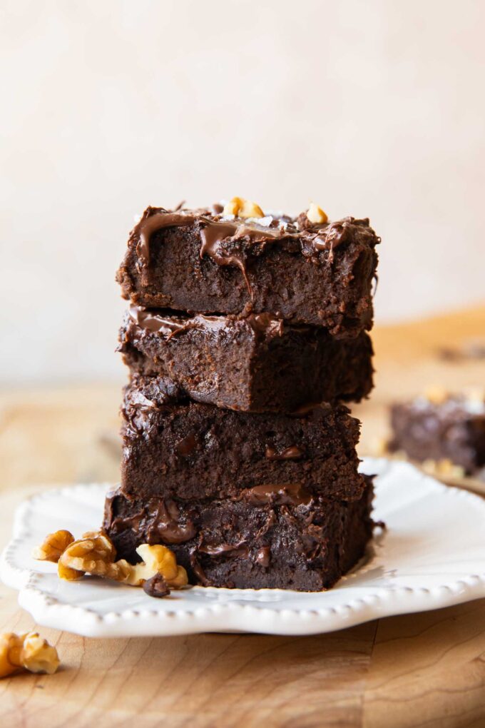 Black bean brownies stacked on top of each other.
