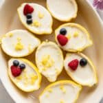 Lemon posset inside a lemon peel.