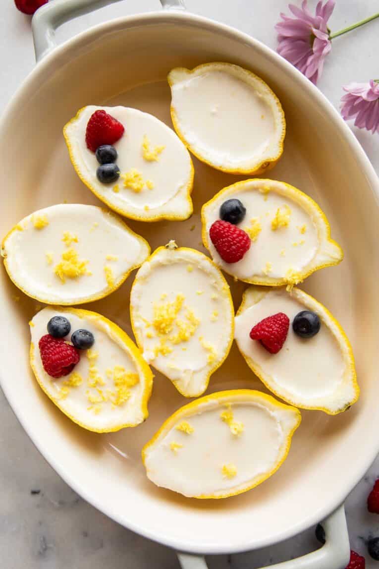 Lemon posset inside a lemon peel.