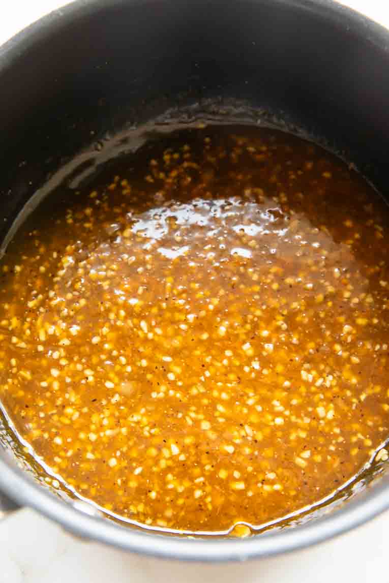 Orange ginger sauce in a pot.