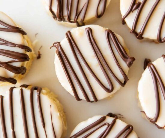 Top view of zebra cakes on a cutting board.