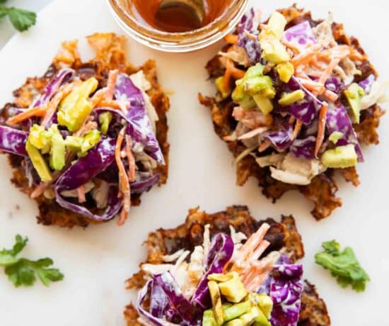 Hot honey sweet potato waffles on a cutting board.