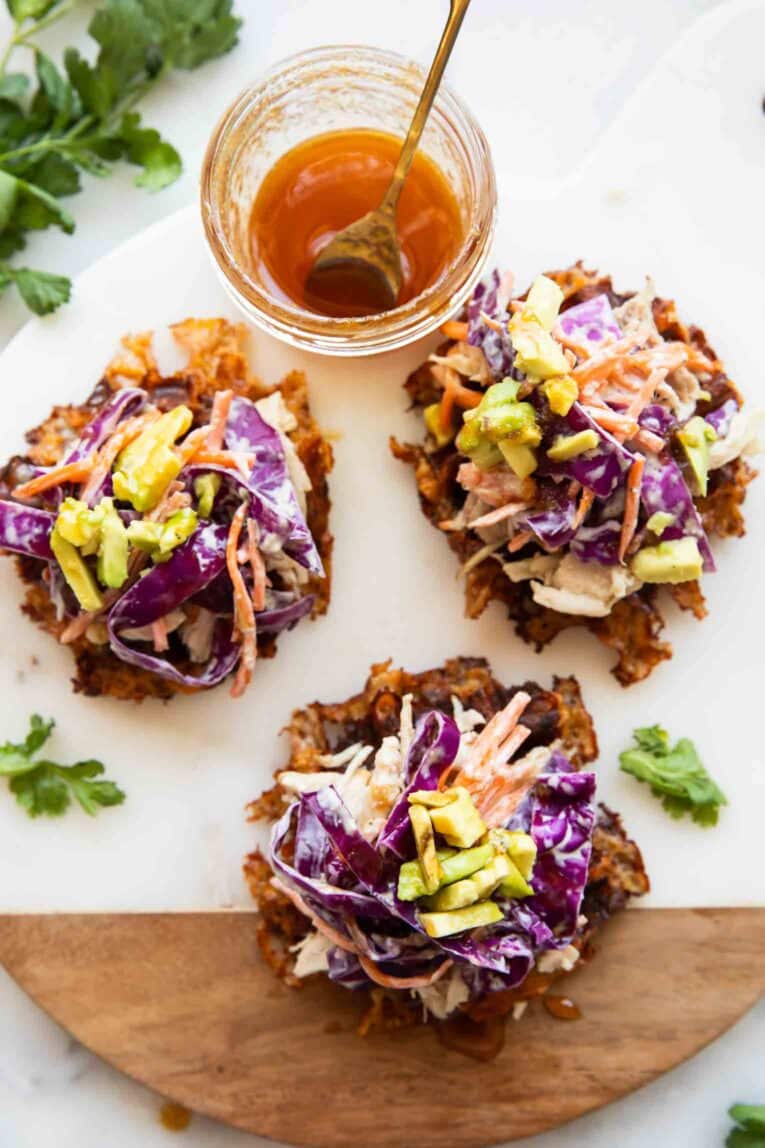 Hot honey sweet potato waffles on a cutting board.