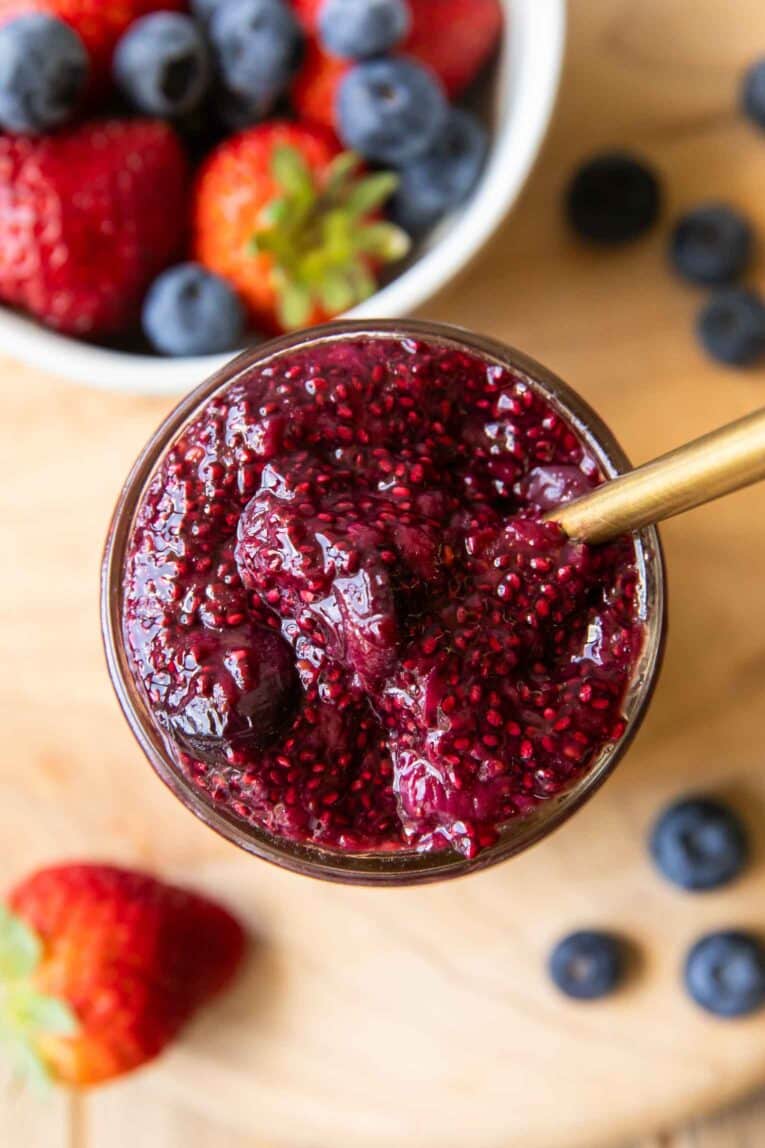 Top view of chia seed jam in a mason jar.