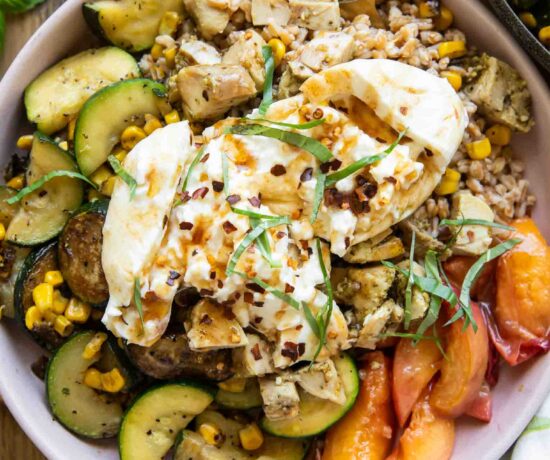 Honey honey peach burrata in a bowl.