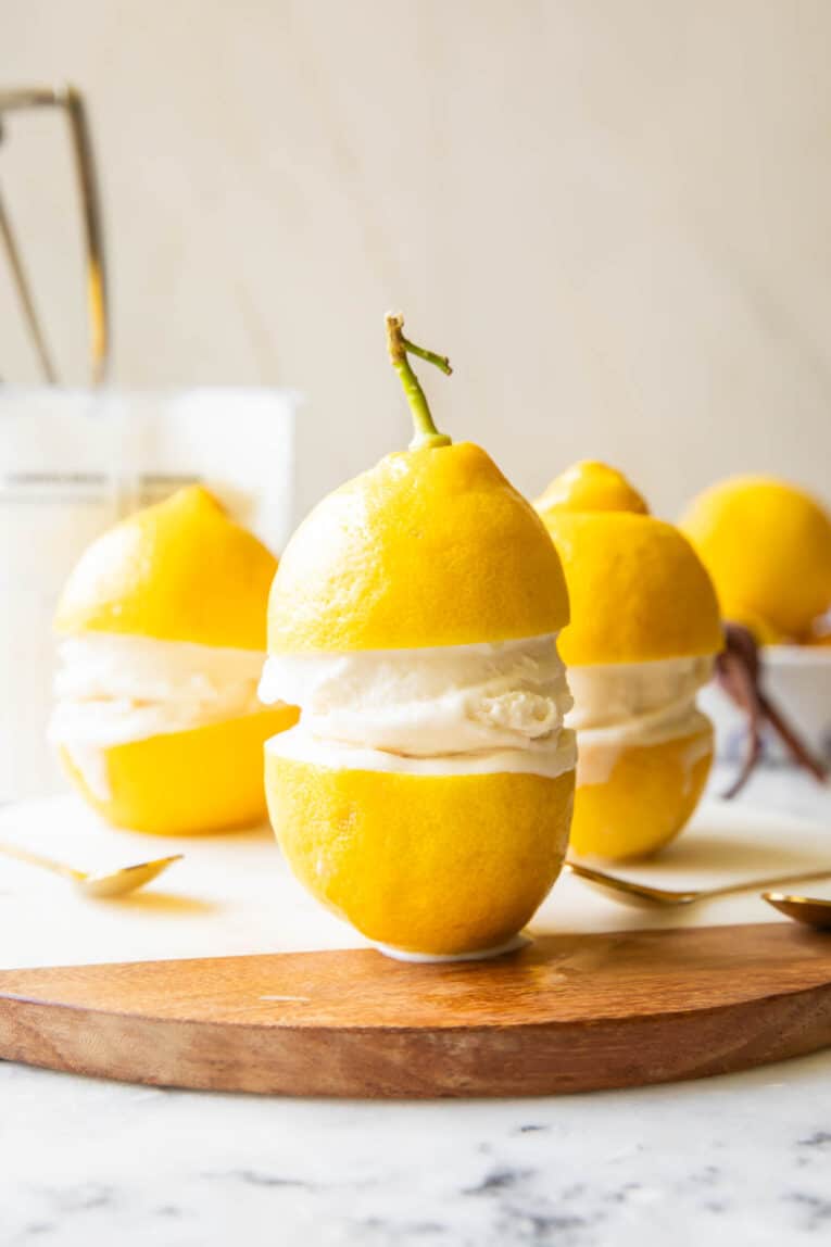 Limoncello Ice Cream in between two lemons.