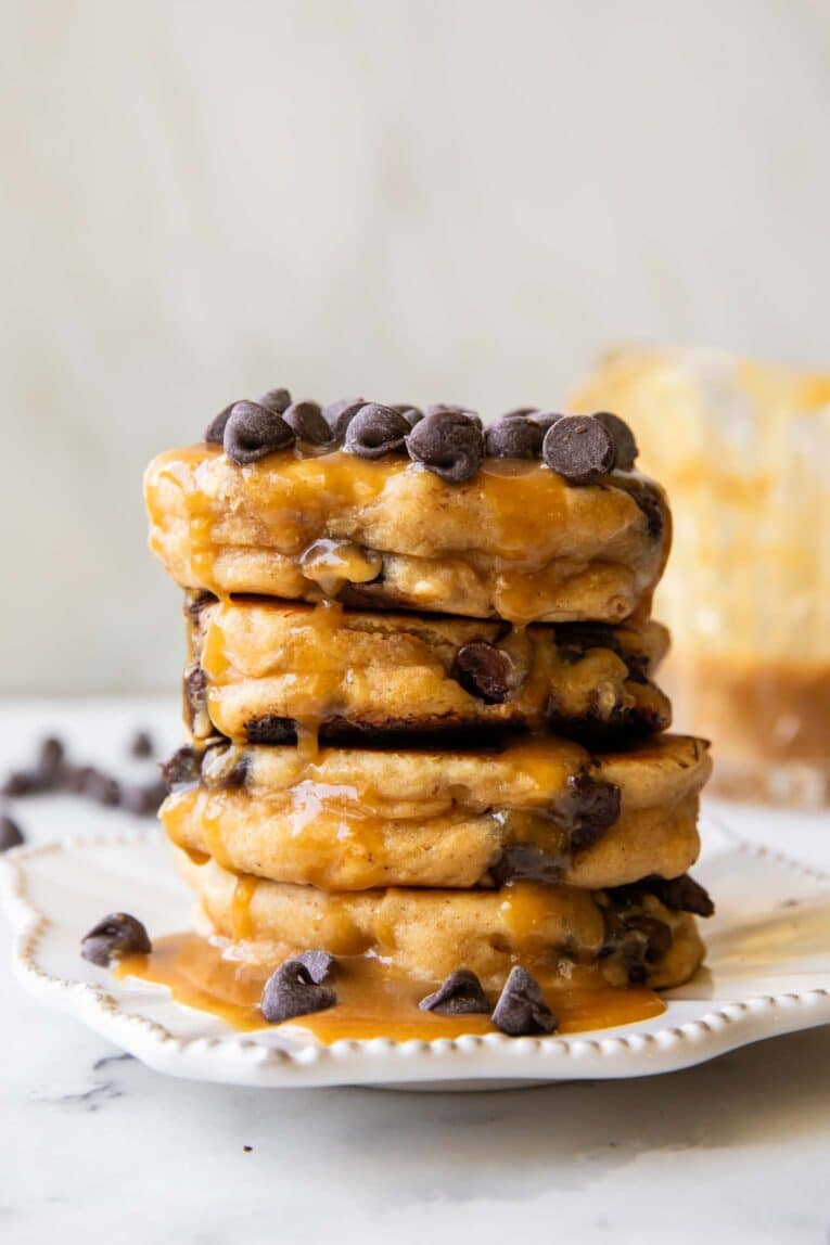 A stack of Peanut Butter Chocolate Chip Pancakes on a plate.