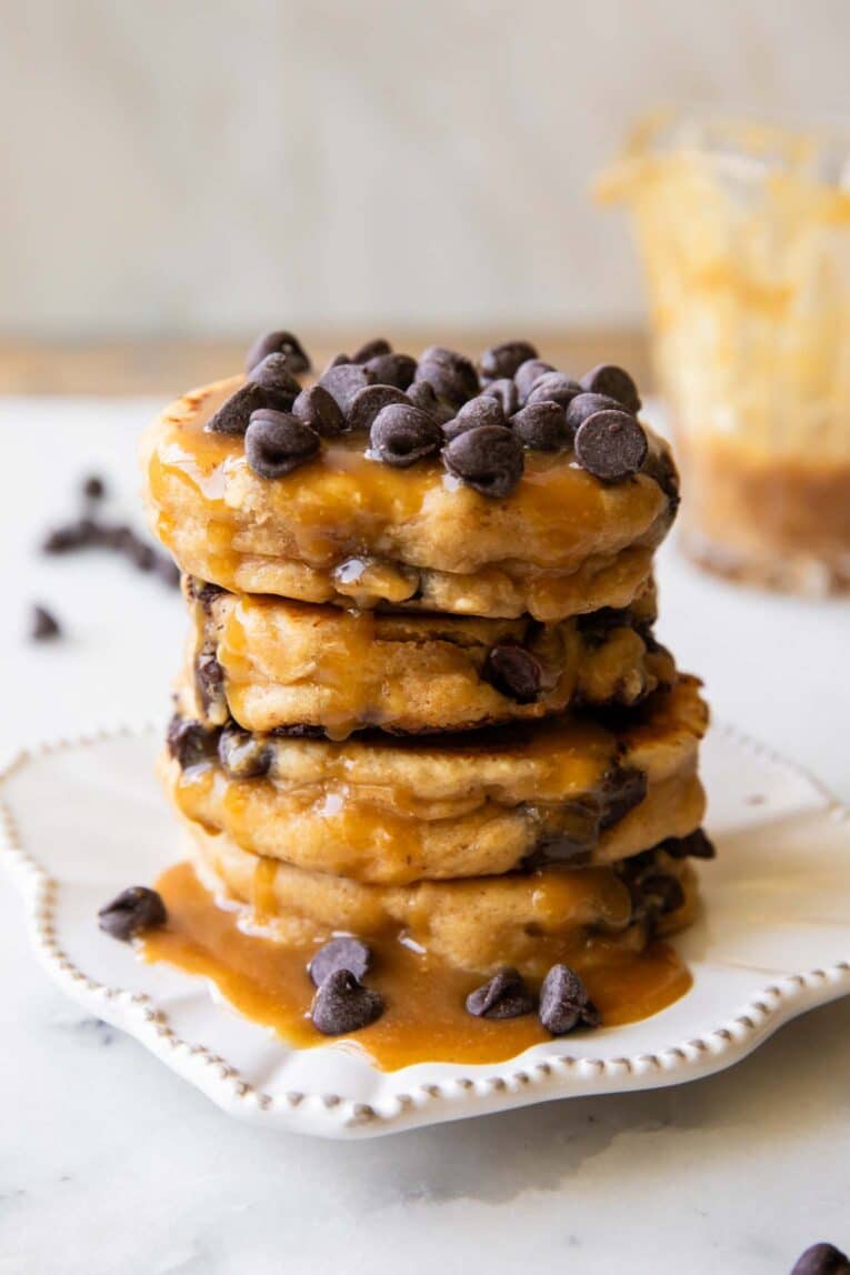 A stack of Peanut Butter Chocolate Chip Pancakes on a plate.