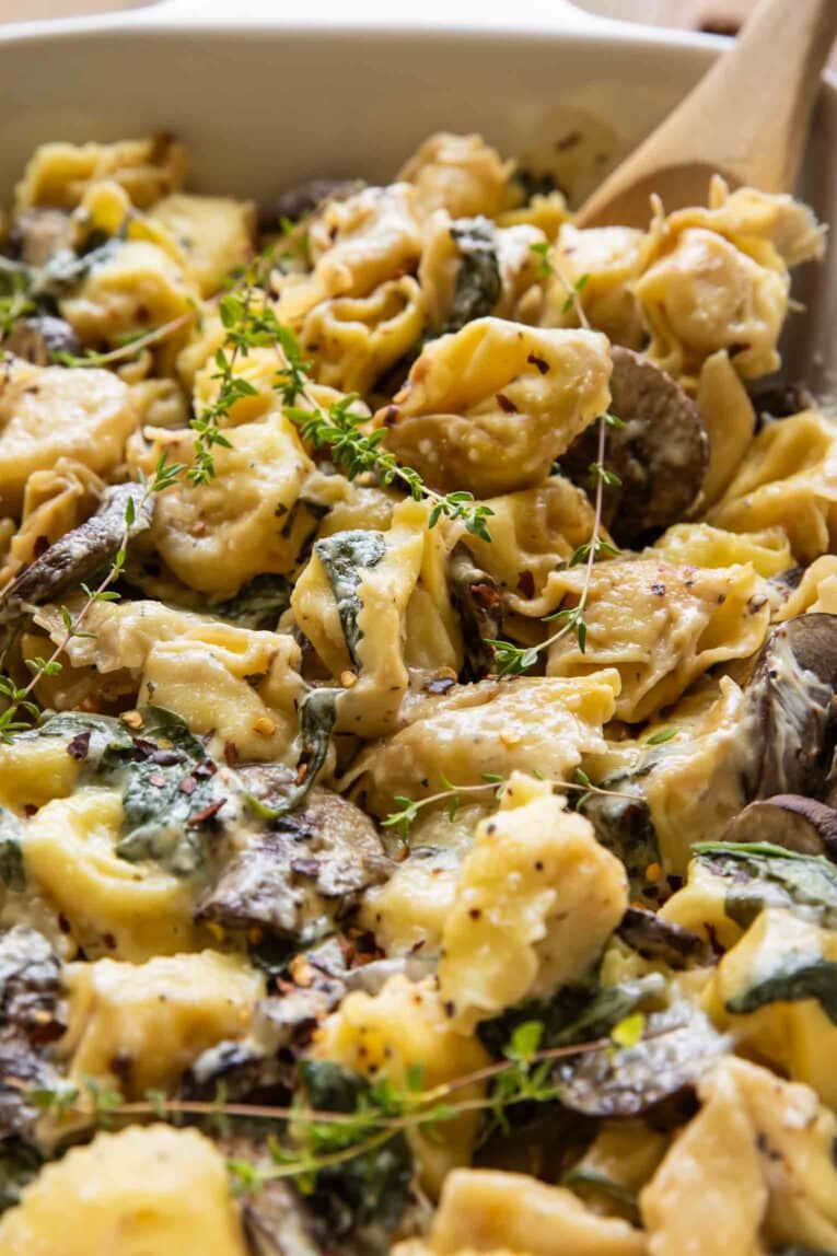 Close up image of Spinach & Mushroom Bake in a baking dish.