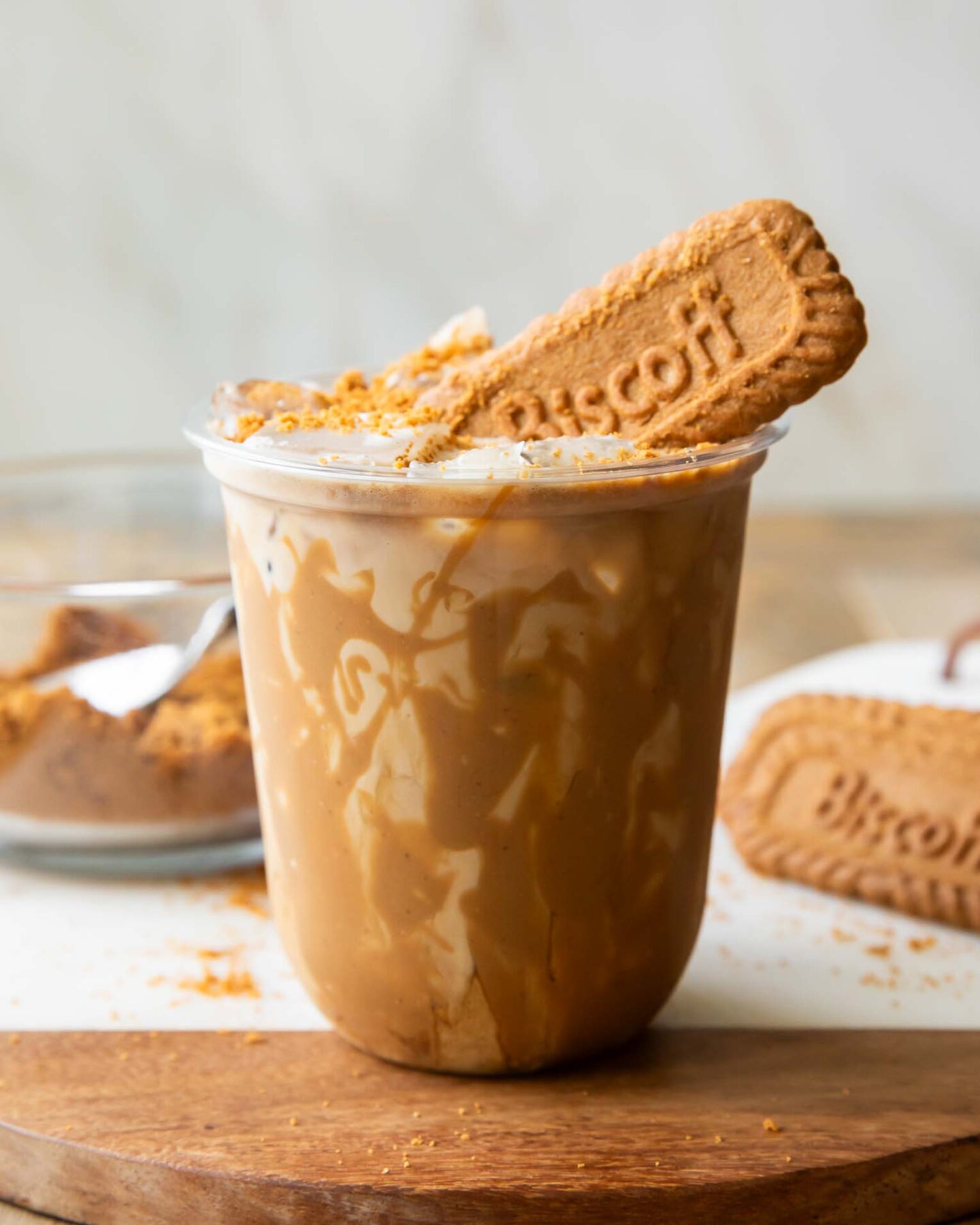 Iced Biscoff latte in a clear cup.