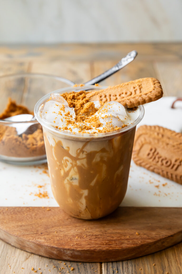 Iced Biscoff latte in a clear cup.