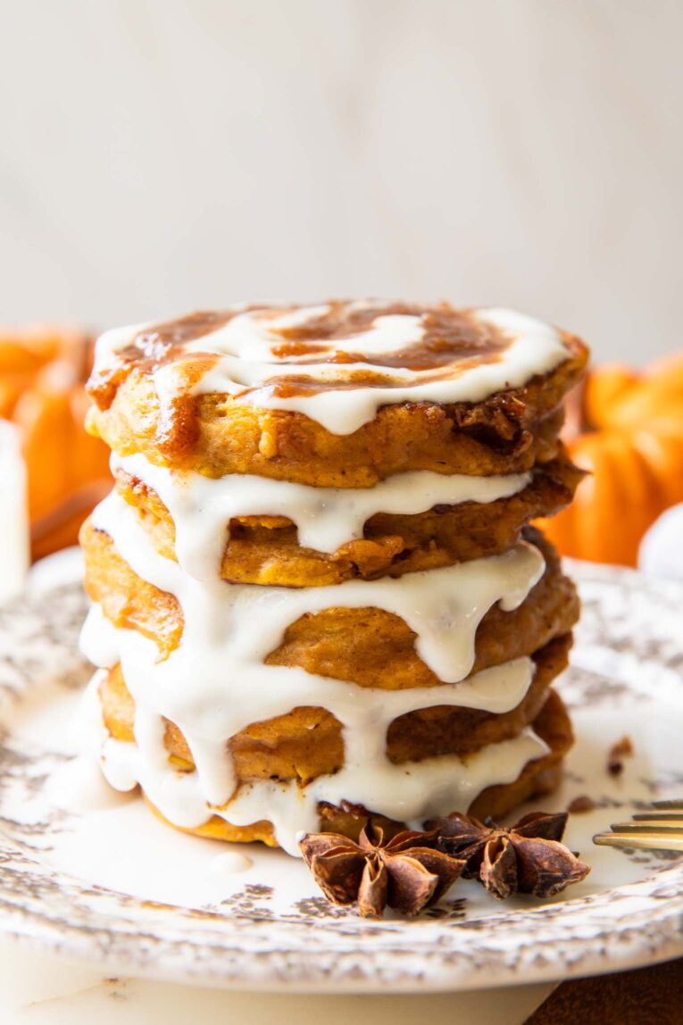 A stack of Pumpkin Cinnamon Roll Pancakes.