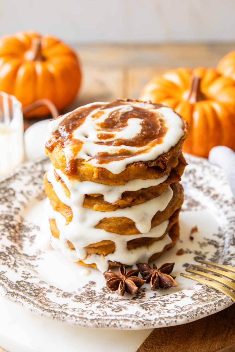 A stack of Pumpkin Cinnamon Roll Pancakes.