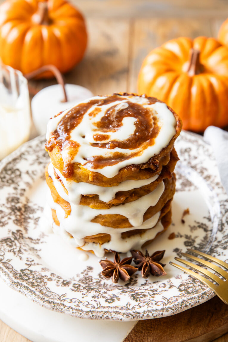 A stack of pumpkin cinnamon roll pancakes.