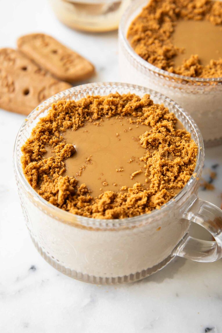 Biscoff overnight oats in a glass cup.