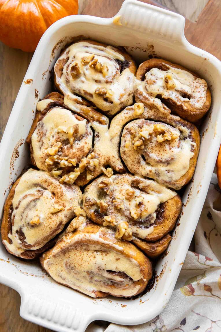 Pumpkin Cinnamon Rolls in a baking pan.